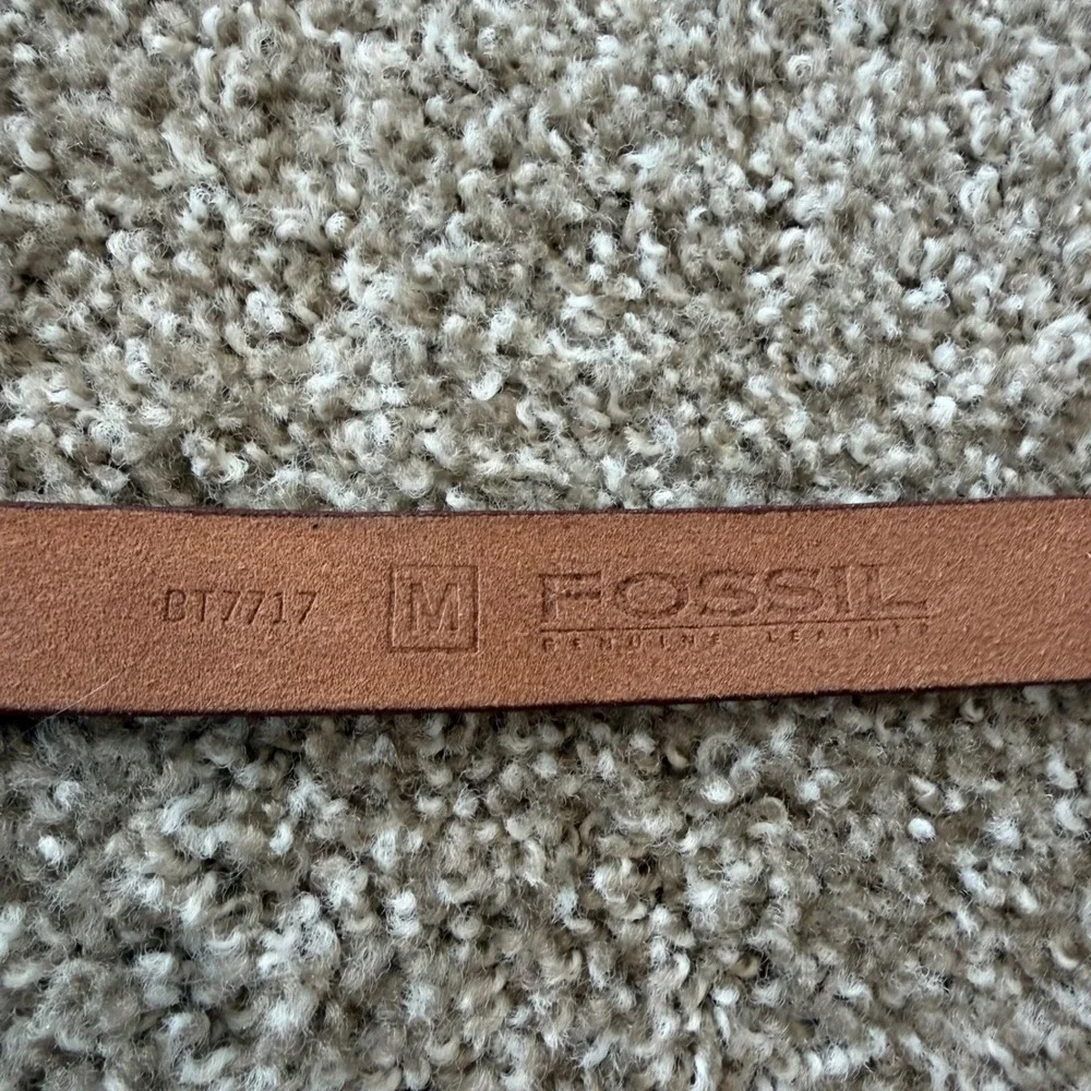 Fossil leather belt